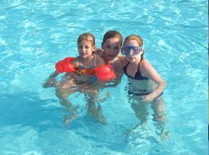 kids enjoying the pool in summer